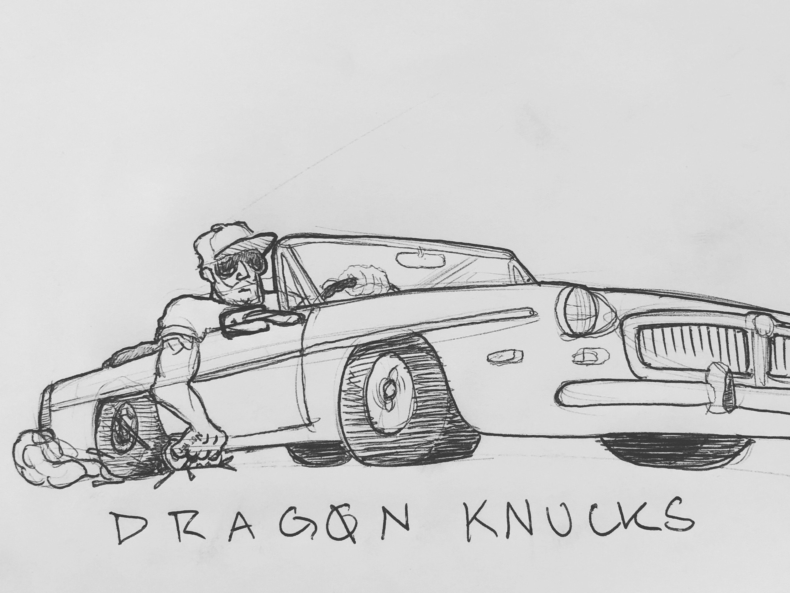  self portrait of me in my first car dragging magnesium knuckles on the ground to make sparks. I would often grab the front of the rear wheel well while driving and often thought I might knick my knuckles on the road if I weren't careful. The car was unmodified